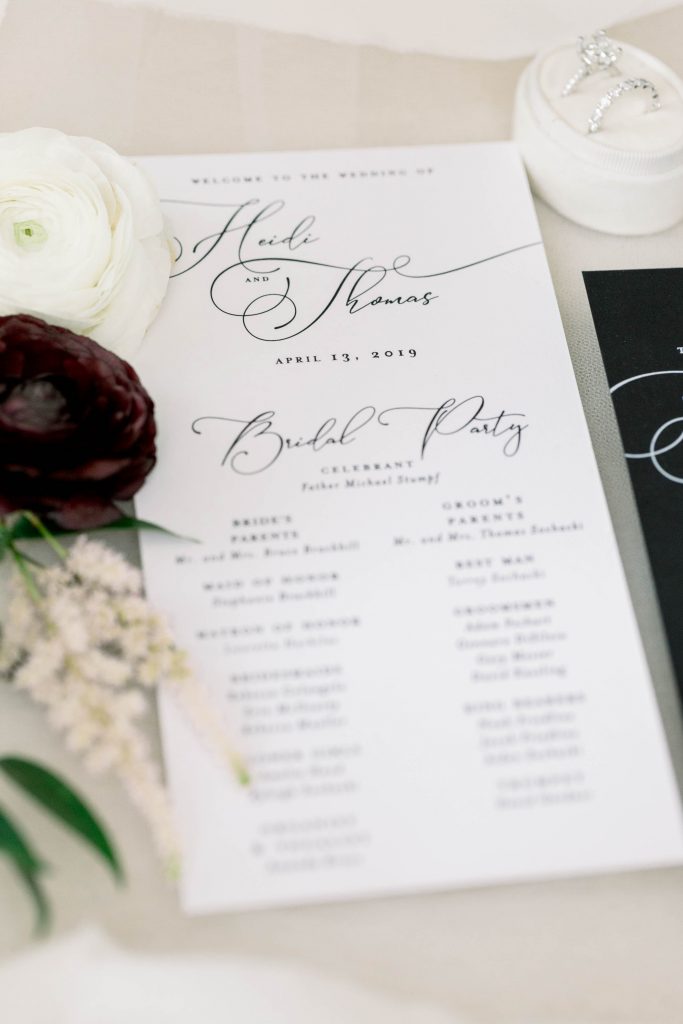 Flowing script danced across the invitations letting their guests know this was a formal wedding with a fun reception waiting for them at the Carnegie Music Hall. An all black invitation with white text stood out against their white enclosure cards, creating a modern vibe their guests will never forget.